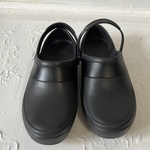 Black slip on crocs casualwear With strap across